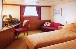 Celebrity Xpedition - Celebrity Cruises - interiér vnější kajuty s výhledem na okolní moře